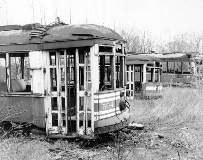 Frank Carbaugh, first conductor on streetcar in 1892, prepares for last run of streetcar, June 1947